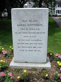 A picture of a monument for Samuel Whittemore with the inscription "Near this spot, Samuel Whittemore, then 80 years old, killed three British soldiers, April 19, 1775.  He was shot, bayoneted, beaten and left for dead, but recovered and lived to be 98 years of age."