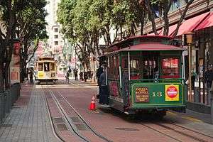 Cable car number thirteen at the Powell Street terminus with another car in the background