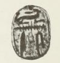 A small seal in the shape of a scarab inscribed with hieroglyphs spelling the name Unas.