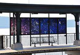 Stained glass windows in a train station shelter