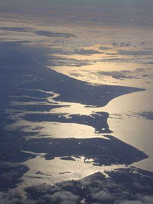 A high aerial view of Portsea Island (the island which Portsmouth is situated on), and neighbouring Hayling Island.