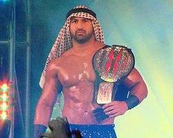 Sheik Abdul Bashir with the TNA X Division Championship belt at Bound for Glory IV