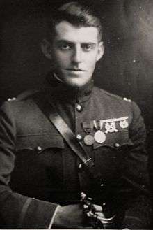 Half-length portrait of man in military attaché dress