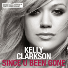 A front face image of a blond woman. She is wearing a black tank top against a grey background and her hair is swept to the right. Below her chin, the word "Kelly Clarkson" is written in white capital letters. Below the word, "Since U Been Gone" is written in pink capital letters.