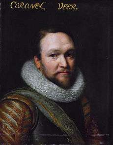 Head and shoulders portrait of a man in 17th century military attire.  He wears a breastplate and a thick fur collar.  He has a short brown beard and mustache and a very slight smile.