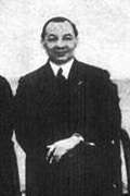 Head-and-shoulders portrait of a Eurasian gentleman in a suit