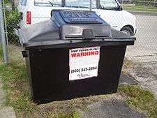 A large bin, with "GREASE ONLY" stamped on the lid.