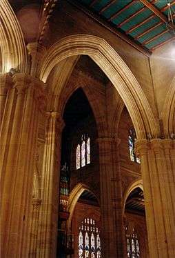 This angle view in St Andrew's shows high arches overlapping each other.