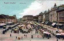 Tinted postcard of a busy marketplace
