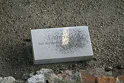 Stone set on the ground inscribed with "Laurence, second Archbishop of Canterbury 605–619, d. 619"