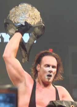 Sting with the TNA World Heavyweight Championship belt at Bound for Glory IV