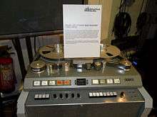 A colour image of a grey recording machine