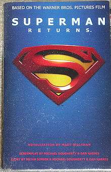 The front cover has the title, in light blue, above the Superman logo. The title and the Superman shield are embossed and set against a blue blackground. The cover is essentially the original teaser poster for the film.