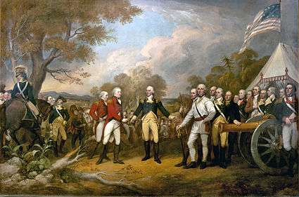 A color painting. In the center is the white-haired Horatio Gates, facing front, wearing a blue military jacket, yellow pants, and knee-length dark boots.  His right hand is reaching out to accept the sword of John Burgoyne, who faces to the right, and wears a red coat and white pants.  Behind and to his left is another similarly attired officer. Behind him, and to the left of Gates, are Continental Army soldiers wearing a variety of different uniforms; those on the right of the painting are standing behind a brass cannon, and to the far left is a blue-coated man on a gray horse.  The background on the left is countryside with hills visible in the distance, and a partly cloudy sky.  The background on the right includes a white tent, above which waves a flag similar to the United States flag, although it has a smaller number of stars on the blue field, arranged in a square.