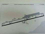 A map showing the runway, taxiways and other structures of the airport.