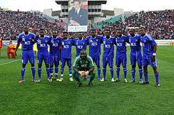 Players from Mazembe lining up for a photo before a match.