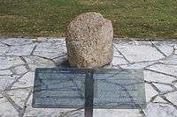 Image of the Tecumseh Stone, and accompanying plaque, at Fort Malden; Tecumseh reportedly stood on the stone to address British troops after the Battle of Lake Erie