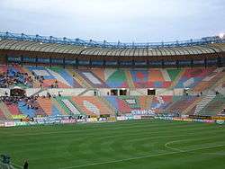 Sports stadium with seats in a variety of colors