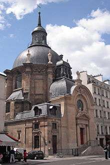 A picture of the architecturally impressive Temple du Marais as seen from the street.