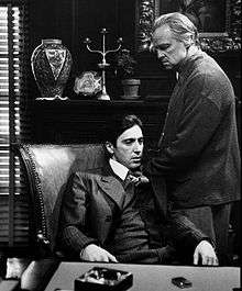 A screenshot of Michael and Vito Corleone during The Godfather.