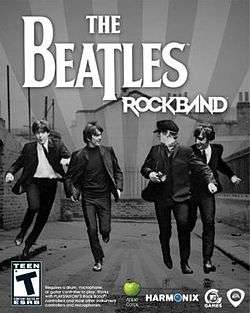 A black-and-white image, showing the four Beatles running in the foreground, against a block of buildings, styled with the game's logo and a grayscale starburst from the center