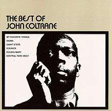 A photograph of John Coltrane's torso, holding his right hand up to his head with a thick black border and the album and song titles around him