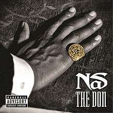 A hand is set down on a tablecloth: a gold ring is worn on the little finger, whilst the words "Nas" and "The Don" have been superimposed onto the bottom right-hand corner of the picture.