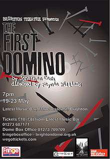 Theatrical poster for the play "The First Domino"; text shows the dates 19–23 May and location of Brighton theatre with details, overlaid on a stylised scattering of nails, in shades of grey and some in red