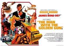 A man in a dinner jacket holding a pistol is in the centre of the picture. Various scenes and images surround him, including two women in bikinis, a midget with a pistol, a car stunt and explosions. At the bottom right, oversized and pointing towards the man in the dinner jacket, is a golden gun, with a hand holding a bullet, about to load the gun. The top of the picture has the words "ROGER MOORE as JAMES BOND 007". At the bottom are the words "THE MAN WITH THE GOLDEN GUN".