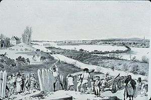 Wide river with pontoon bridge in background, and civilians and soldiers picking up palisades and wood in foreground.