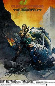 Official poster with artwork shows cartooned Clint Eastwood with ripped off shirt and jeans ,holding his gun and hugging Locke ,behind them there is a ruined and riddled bus and a building. Below of the duo ,there is the film's title ,credits and release date and above the film's slogan.