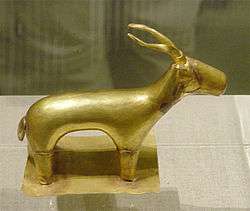 A simple golden figure, displayed.