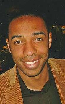 A coloured portrait of footballer Thierry Henry, who was Arsenal's top goalscorer for the 2003–04 season