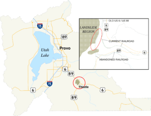 Map showing an area of Utah County circled and enlarged to the southeast of Utah Lake. The enlarged area shows an abandoned rail and highway grades to the west and south of replacement rail and highway grades.