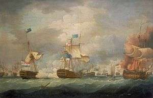 On a stormy sea beneath towering clouds, a number of sailing warships battle. In the foreground are three ships, two to the right of the frame bridged by clouds of smoke and the mainmast of the far right ship, which bears a prominent horizontally striped flag is toppling. To the left of the frame a third ship drifts as flames leap from its deck.