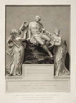 Engraving of a sculpture of a man seated on a rock, surrounded by two bare-breasted nymphs. One is playing a harp and placing a crown of laurels on his head.