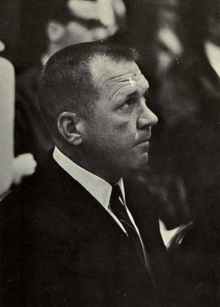 Bartlett in coat and tie, taken during game