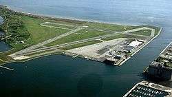 airport runways on island surrounded by water