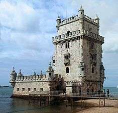 White tower near the sea