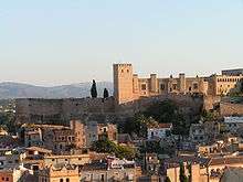 Photo of fortress looming above the city of Tortosa