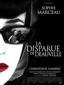 Poster showing Sophie Marceau wearing dark sunglasses