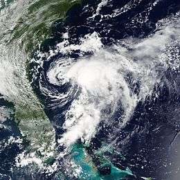 Satellite imagery of a disorganized tropical storm near its peak intensity.