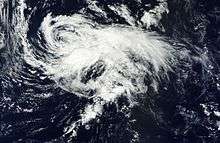 Nadine is rather disorganized, with ragged banding features and a partly exposed center of circulation.