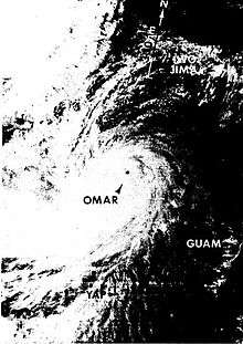 Black and white satellite image of Typhoon Omar depicting the storm's well-defined eye and expansive cyclonic cloud cover.