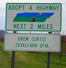 This is an image of the Adopt-a-Highway sign that was erected in Tennessee in April 2006 to highlight the UFIA (Unsolicited Finger In Anus) cliché
