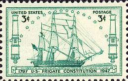 A postage stamp accurately depicts Constitution at sail. The ship sails to the right side of the stamp.