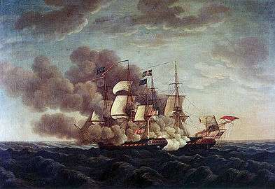 Picture of a sail-powered warship with guns ablaze.