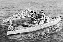 Kearsarge with a large crane on her deck