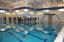 Guests tour the new LT Michael Murphy Combat Training Pool during a dedication ceremony at Officer Training Command, Newport. The pool will be used by officer candidates and students at Officer Training Command Newport for swim qualifications.