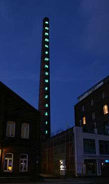 Illuminated Fibonacci numbers at the chimney of the former Linden brewery, now the location of the museum.